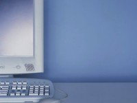 Computer Monitor and Keyboard on Desk
